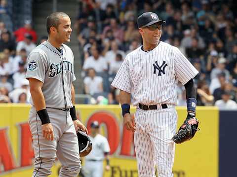 Jesus Montero and Derek Jeter in 2012 (Photo by Jim McIsaac/Getty Images)