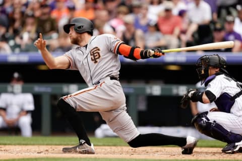 May 29, 2016; Denver, CO, USA; San Francisco Giants right fielder Hunter Pence (8) hits an RBI double in the third inning against the Colorado Rockies at Coors Field. Mandatory Credit: Isaiah J. Downing-USA TODAY Sports