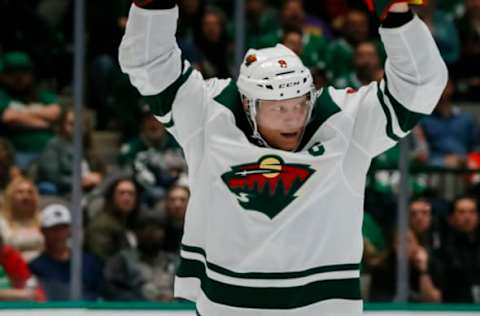 DALLAS, TX – OCTOBER 29: Minnesota Wild center Mikko Koivu (9) redirects the puck into the net past Dallas Stars goaltender Anton Khudobin (35) during the game between the Dallas Stars and the Minnesota Wild on October 29, 2019, at the American Airlines Center in Dallas, Texas. (Photo by Matthew Pearce/Icon Sportswire via Getty Images)