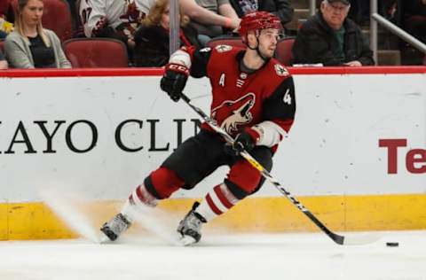 GLENDALE, AZ – FEBRUARY 14: Arizona Coyotes defenseman Niklas Hjalmarsson (4) controls the puck during the NHL hockey game between the St. Louis Blues and the Arizona Coyotes on February 14, 2019 at Gila River Arena in Tempe, Arizona. (Photo by Kevin Abele/Icon Sportswire via Getty Images)