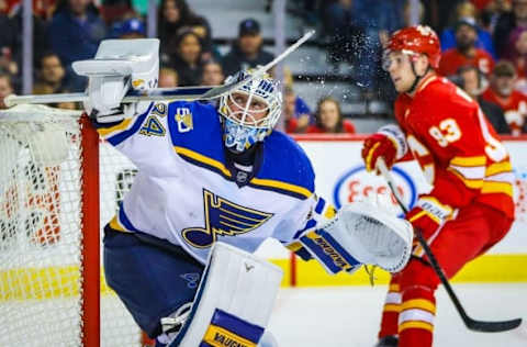 Oct 22, 2016; Calgary, Alberta, CAN; St. Louis Blues goalie Jake Allen (34) makes a save against Calgary Flames during the second period at Scotiabank Saddledome. Mandatory Credit: Sergei Belski-USA TODAY Sports