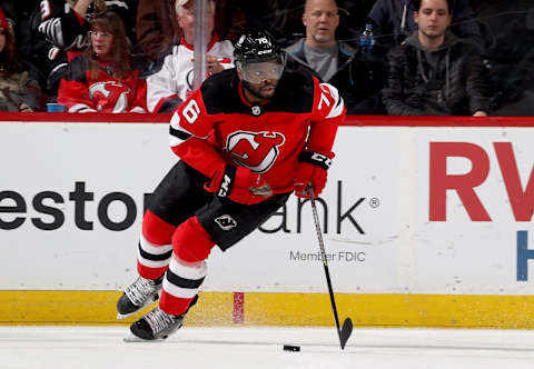 NEWARK, NEW JERSEY – APRIL 21: P.K. Subban #76 of the New Jersey Devils takes the puck during the second period against the Buffalo Sabres at Prudential Center on April 21, 2022 in Newark, New Jersey. (Photo by Elsa/Getty Images)