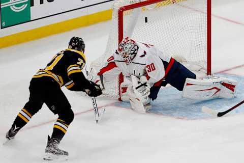 May 19, 2021; Boston, Massachusetts, USA; Boston Bruins left wing Taylor Hall (71) scores on Washington Capitals goaltender Ilya Samsonov (30) during the second period in game three of the first round of the 2021 Stanley Cup Playoffs at TD Garden. Mandatory Credit: Winslow Townson-USA TODAY Sports