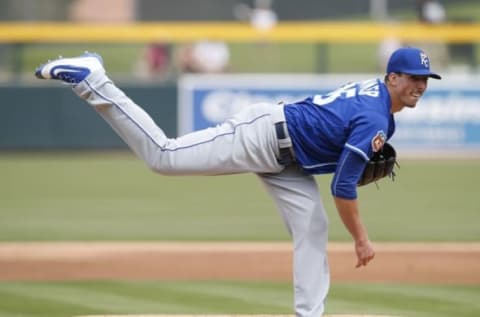 Mar 7, 2016; Mesa, AZ, USA; Kansas City Royals pitcher Kyle Zimmer (45) throws in the first inning against the Oakland Athletics during a spring training game against the Oakland Athletics at HoHoKam Stadium. Mandatory Credit: Rick Scuteri-USA TODAY Sports