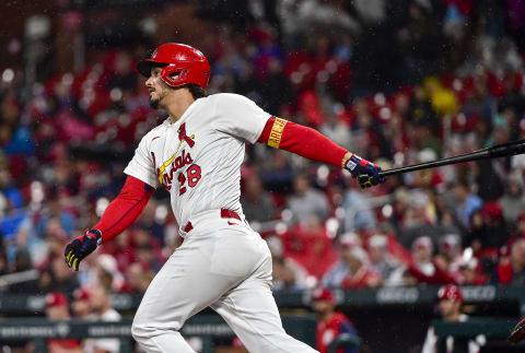 Apr 28, 2022; St. Louis, Missouri, USA; St. Louis Cardinals third baseman Nolan Arenado (28) hits a single against the Arizona Diamondbacks during the sixth inning at Busch Stadium. Mandatory Credit: Jeff Curry-USA TODAY Sports