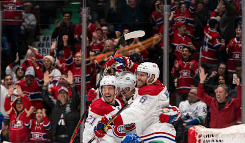 VANCOUVER, BC – DECEMBER 17: Shea Weber #6 of the Montreal Canadiens celebrates with teammates Nick Cousins #21 and Joel Armia #40 after scoring a goal during NHL action against the Vancouver Canucks at Rogers Arena on December 17, 2019 in Vancouver, Canada. (Photo by Rich Lam/Getty Images)