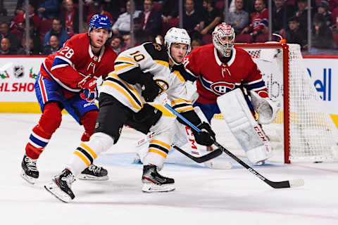 MONTREAL, QC – NOVEMBER 26: Boston Bruins left wing Anders Bjork (10), Montreal Canadiens defenceman Mike Reilly (28) and Montreal Canadiens goalie Carey Price (31) tracks the play during the Boston Bruins versus the Montreal Canadiens game on November 26, 2019, at Bell Centre in Montreal, QC (Photo by David Kirouac/Icon Sportswire via Getty Images)