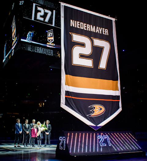 ANAHEIM, CA – FEBRUARY 17: Former Anaheim Duck, Scott Niedermayer watches his jersey rise to the rafters with his family during the jersey retirement ceremony prior to the game between the Anaheim Ducks and the Boston Bruins on February 17, 2019 at Honda Center in Anaheim, California. (Photo by Foster Snell/NHLI via Getty Images)