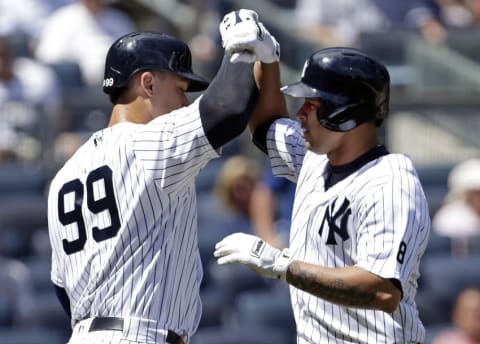 Aug 17, 2016; Bronx, NY, USA; New York Yankees designated hitter Gary Sanchez (24) celebrates hitting a solo home run against the Toronto Blue Jays with Aaron Judge (99) during the second inning at Yankee Stadium. Mandatory Credit: Adam Hunger-USA TODAY Sports