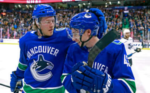 VANCOUVER, BC – MARCH 28: Brock Boeser #6 of the Vancouver Canucks is congratulated by teammate Quinn Hughes #43 after scoring during their NHL game against the Los Angeles Kings at Rogers Arena March 28, 2019 in Vancouver, British Columbia, Canada. (Photo by Jeff Vinnick/NHLI via Getty Images)