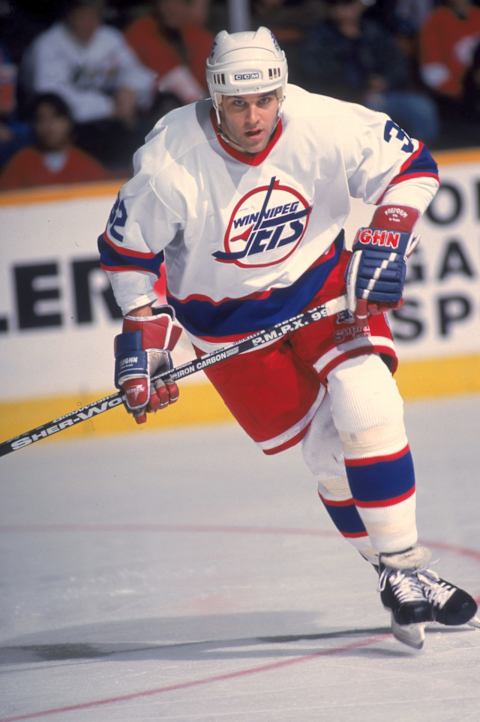 Canadian professional hockey player Mike Eastwood, center for the Winnipeg Jets, on the ice during a home game at the Winnipeg Arena, Winnipeg, Manitoba, Canada, March, 1996. (Photo by Bruce Bennett Studios/Getty Images)