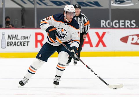 VANCOUVER, BC – MAY 03: James Neal #18 of the Edmonton Oilers skates with the puck during NHL action against the Vancouver Canucks at Rogers Arena on April 16, 2021 in Vancouver, Canada. (Photo by Rich Lam/Getty Images)