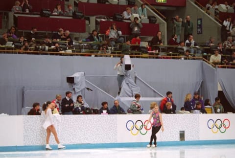 Nancy Kerrigan (left) and Tonya Harding practice in Lillehammer before the 1994 Olympics.