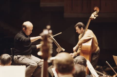 Gary Karr (right) plays a double bass, possibly the Karr-Koussevitzky bass, in a 1969 concert.