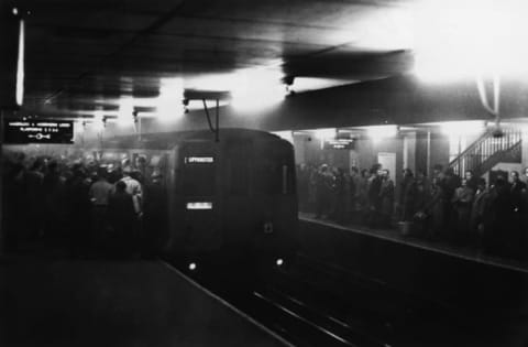 Large numbers of people pictured using the underground system to get around London on December 8, 1952, during a period of heavy smog, which hampered transport on the roads.