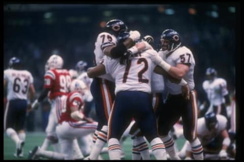 The Chicago Bears celebrate after William "The Refrigerator" Perry scores a touchdown during Super Bowl XX against the New England Patriots.