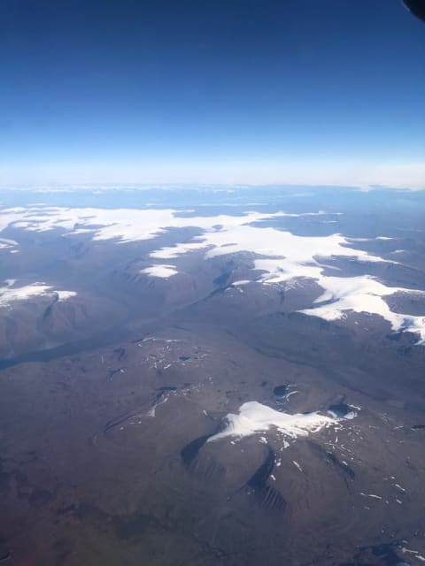 Greenland's west coast appeared scoured by wind and ice.