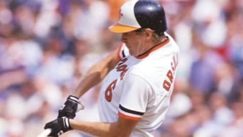 Joe Orsulak, 6, swings at a pitch while batting for the Baltimore Orioles.