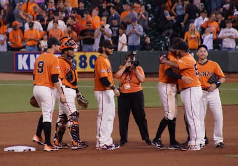 Hunter Pence hugging Yusmeiro Petit after the win on 9/6/13. Photo by Denise Walos.