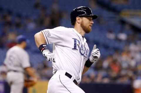 Jul 8, 2014; St. Petersburg, FL, USA; Tampa Bay Rays second baseman Ben Zobrist (18) runs out a single during the sixth inning against the Kansas City Royals at Tropicana Field. Mandatory Credit: Kim Klement-USA TODAY Sports