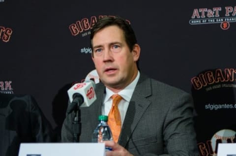 Dec 17, 2015; San Francisco, CA, USA; San Francisco Giants senior vice president and general manager Bobby Evans announces the signing of pitcher Johnny Cueto at a press conference at AT&T Park. Mandatory Credit: John Hefti-USA TODAY Sports