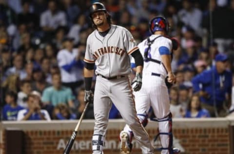 Sep 1, 2016; Chicago, IL, USA; San Francisco Giants right fielder Jarrett Parker (6) reacts after striking out against the Chicago Cubs during the seventh inning at Wrigley Field. Mandatory Credit: Kamil Krzaczynski-USA TODAY Sports