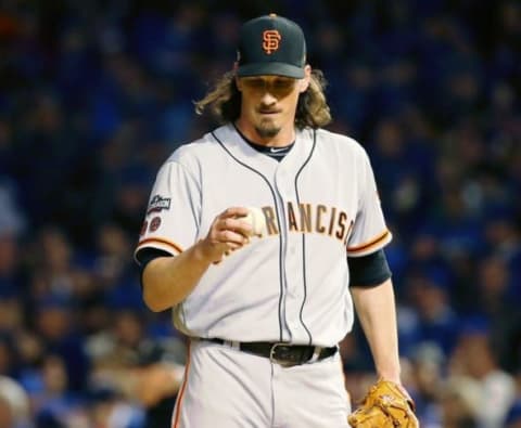 Oct 8, 2016; Chicago, IL, USA; San Francisco Giants starting pitcher Jeff Samardzija (29) reacts after giving up an RBI single to Chicago Cubs left fielder Ben Zobrist (18) during the first inning during game two of the 2016 NLDS playoff baseball series at Wrigley Field. Mandatory Credit: Jerry Lai-USA TODAY Sports