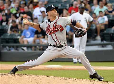 Jul 19, 2013; Chicago, IL, USA; Atlanta Braves starting pitcher Tim Hudson (15) throws a pitch against the Chicago White Sox during the first inning at U.S. Cellular Field. Mandatory Credit: Mike DiNovo-USA TODAY Sports