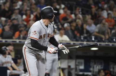 SAN DIEGO, CA – SEPTEMBER 18: Chris Shaw #26 of the San Francisco Giants hits a two RBI single during the eighth inning of a baseball game against the San Diego Padres at PETCO Park on September 18, 2018 in San Diego, California. (Photo by Denis Poroy/Getty Images)