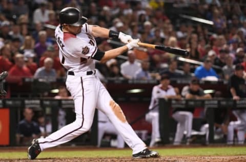 PHOENIX, AZ – SEPTEMBER 26: A.J. Pollock #11 of the Arizona Diamondbacks hits a three-run home run in the fifth inning of the MLB game against the Los Angeles Dodgers at Chase Field on September 26, 2018 in Phoenix, Arizona. (Photo by Jennifer Stewart/Getty Images)