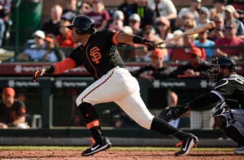 SCOTTSDALE, ARIZONA – FEBRUARY 25: Yangervis Solarte #22 of the San Francisco Giants hits an RBI single against the Chicago White Sox during the spring training game at Scottsdale Stadium on February 25, 2019 in Scottsdale, Arizona. (Photo by Jennifer Stewart/Getty Images)