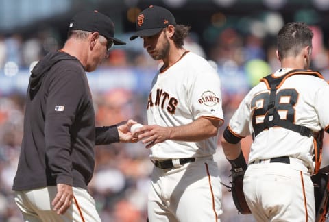 SAN FRANCISCO, CA – APRIL 13: Manager Bruce Bochy #15 of the San Francisco Giants takes the ball from pitcher Madison Bumgarner #40 taking Bumgarner out of the game against the Colorado Rockies in the top of the eighth inning at Oracle Park on April 13, 2019 in San Francisco, California. (Photo by Thearon W. Henderson/Getty Images)