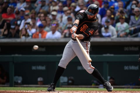 MESA, ARIZONA – MARCH 21: Brandon Belt #9 of the San Francisco Giants hits a two run home run in the first inning of the spring training game against the Chicago Cubs at Sloan Park on March 21, 2019 in Mesa, Arizona. (Photo by Jennifer Stewart/Getty Images)