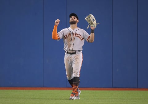 TORONTO, ON – APRIL 23: Kevin Pillar #1 of the San Francisco Giants celebrates their victory during MLB game action against the Toronto Blue Jays Rogers Centre on April 23, 2019 in Toronto, Canada. (Photo by Tom Szczerbowski/Getty Images)