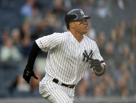 NEW YORK, NEW YORK-MAY 06: Thairo Estrada #30 of the New York Yankees watches his two-run home run in the second inning against the Seattle Mariners at Yankee Stadium on May 06, 2019 in the Bronx borough of New York City.This is Thairo Estrada’s first major league home run. (Photo by Elsa/Getty Images)