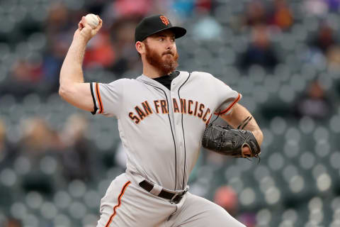 DENVER, COLORADO – MAY 09: Pitcher Sam Dyson #49 of the San Francisco Giants throws at in the eighth inning against the Colorado Rockies at Coors Field on May 08, 2019 in Denver, Colorado. (Photo by Matthew Stockman/Getty Images)