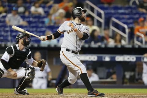 MIAMI, FLORIDA – MAY 30: Brandon Belt #9 of the San Francisco Giants singles in the eighth inning against the Miami Marlins at Marlins Park on May 30, 2019 in Miami, Florida. (Photo by Michael Reaves/Getty Images)