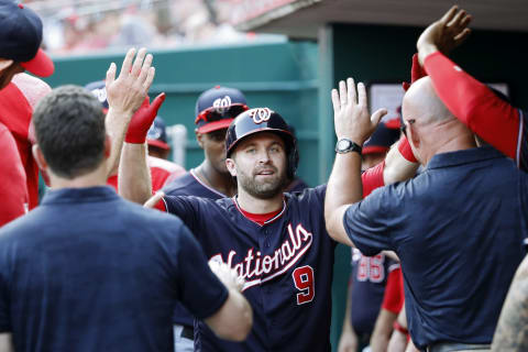 CINCINNATI, OH – JUNE 01: Brian Dozier #9 of the Washington Nationals celebrates in the dugout after hitting a solo home run in the top of the ninth inning against the Cincinnati Reds at Great American Ball Park on June 1, 2019 in Cincinnati, Ohio. The Nationals won 5-2. (Photo by Joe Robbins/Getty Images)-Giants