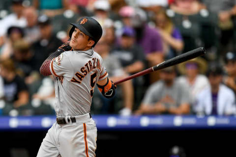 DENVER, CO – JULY 17: Mike Yastrzemski #5 of the San Francisco Giants watches the flight of a fifth-inning double against the Colorado Rockies at Coors Field on July 17, 2019 in Denver, Colorado. (Photo by Dustin Bradford/Getty Images)