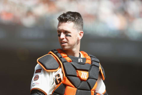 SF Giants catcher Buster Posey will return to the starting lineup in 2021, but who will be joining him on the roster? (Photo by Lachlan Cunningham/Getty Images)