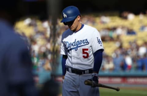 LOS ANGELES, CA – APRIL 25: Corey Seager #5 of the Los Angeles Dodgers looks on after striking out swinging in the first inning during the MLB game against the Miami Marlins at Dodger Stadium on April 25, 2018 in Los Angeles, California. (Photo by Victor Decolongon/Getty Images)