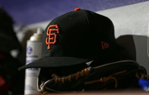 SF Giants hat in the dugout. (Photo by Rich Schultz/Getty Images)