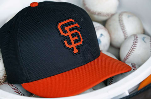 A hat in the SF Giants’ dugout. (Photo by Ralph Freso/Getty Images)