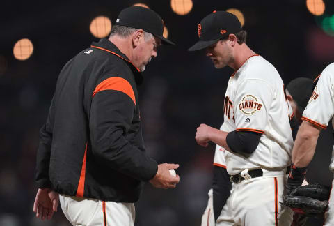 SAN FRANCISCO, CA – SEPTEMBER 25: Manager Bruce Bochy #15 of the SF Giants takes the ball from pitcher Steven Okert #32 taking Okert out of the game against the San Diego Padres in the top of the fifth inning at AT&T Park on September 25, 2018 in San Francisco, California. (Photo by Thearon W. Henderson/Getty Images)