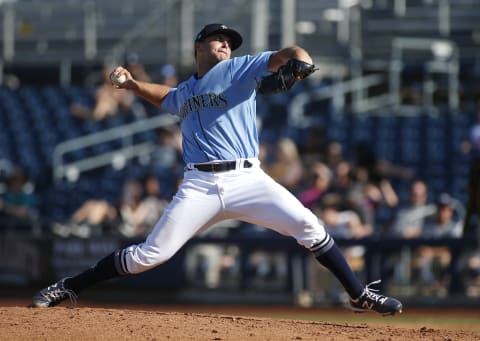 PEORIA, ARIZONA – MARCH 05: Pitcher Sam Delaplane #77 of the Seattle Mariners throws against the San Diego Padres during a Cactus League spring training baseball game at Peoria Stadium on March 05, 2020. The SF Giants acquired Delaplane on Monday. (Photo by Ralph Freso/Getty Images)