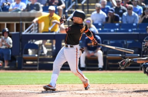 MARYVALE, ARIZONA – MARCH 06: Yolmer Sanchez #2 of the San Francisco Giants follows though on a swing against the Milwaukee Brewers during a spring training game at American Family Fields of Phoenix on March 06, 2020 in Maryvale, Arizona. (Photo by Norm Hall/Getty Images)