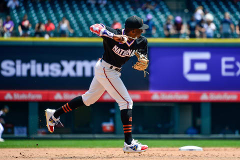 DENVER, CO – JULY 11: Marco Luciano #10 of the National League Futures Team throws a ball as he warms up before a game against the American League Futures Team at Coors Field on July 11, 2021 in Denver, Colorado. Luciano is in the SF Giants organization. (Photo by Dustin Bradford/Getty Images)