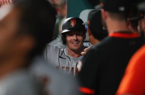 ST LOUIS, MO – JULY 16: Mike Yastrzemski #5 of the San Francisco Giants is congratulated after hitting his second home run of the game, a three-run home run against the St. Louis Cardinals in the seventh inning, at Busch Stadium on July 16, 2021 in St Louis, Missouri. (Photo by Dilip Vishwanat/Getty Images)