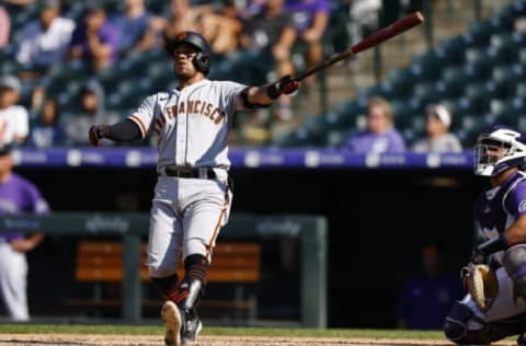 DENVER, CO – SEPTEMBER 6: Thairo Estrada #39 of the San Francisco Giants watches his two run home run as catcher Elias Diaz #35 of the Colorado Rockies looks on during the fifth inning at Coors Field on September 6, 2021 in Denver, Colorado. (Photo by Justin Edmonds/Getty Images)