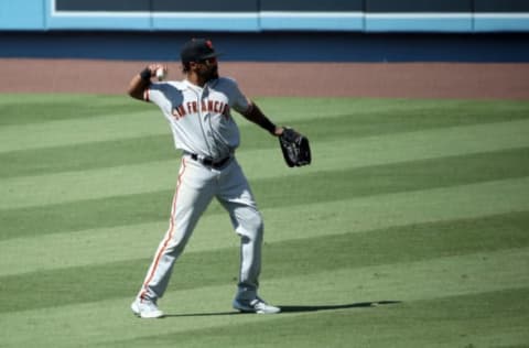 LOS ANGELES, CALIFORNIA – JULY 25: Jaylin Davis #49 of the San Francisco Giants warms up in between innings against the Los Angeles Dodgers at Dodger Stadium on July 25, 2020 in Los Angeles, California. The 2020 season had been postponed since March due to the COVID-19 pandemic. (Photo by Katelyn Mulcahy/Getty Images)